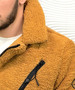 Χνουδωτό χειμωνιάτικο μπουφάν με διαγώνιο φερμουάρ