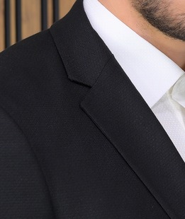Εκλεπτυσμένο ανδρικό μαύρο σακάκι Regular Fit Εκλεπτυσμένο ανδρικό μαύρο σακάκι Regular Fit