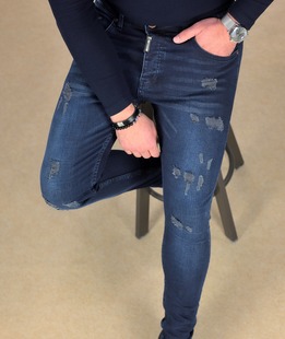 Εκλεπτυσμένο ανδρικό τζιν σε indigo Εκλεπτυσμένο ανδρικό τζιν σε indigo